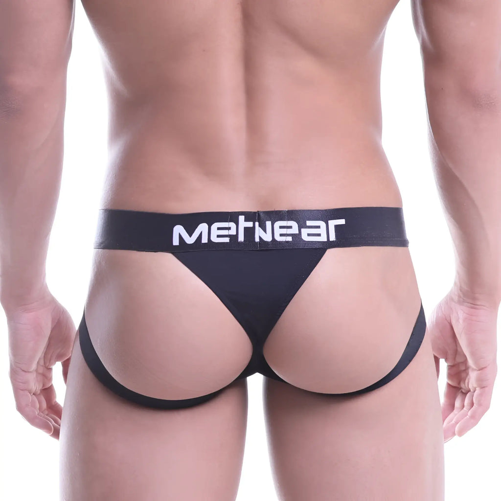 Black metnear brand sports jock thong with white lettering on waistband for activewear use