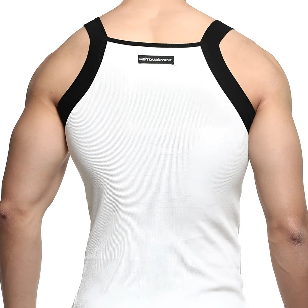 White ribbed square cut tank top with black shoulder straps and metromalewear label at the back