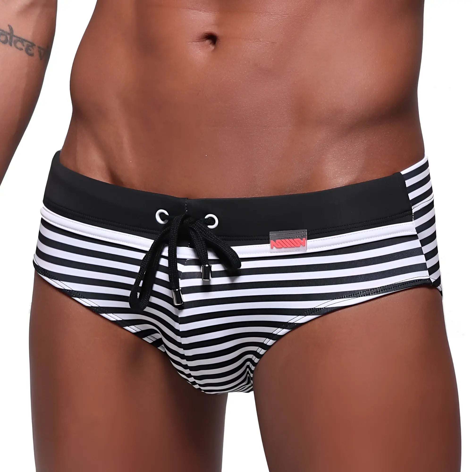 MetroMaleWear stripe swim brief black 4928-03 features black and white stripes with solid black waistband and red brand tag