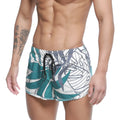 MetroMaleWear summer swim shorts Meadow 4988-09 with teal and white tropical leaf pattern and black drawstring waistband