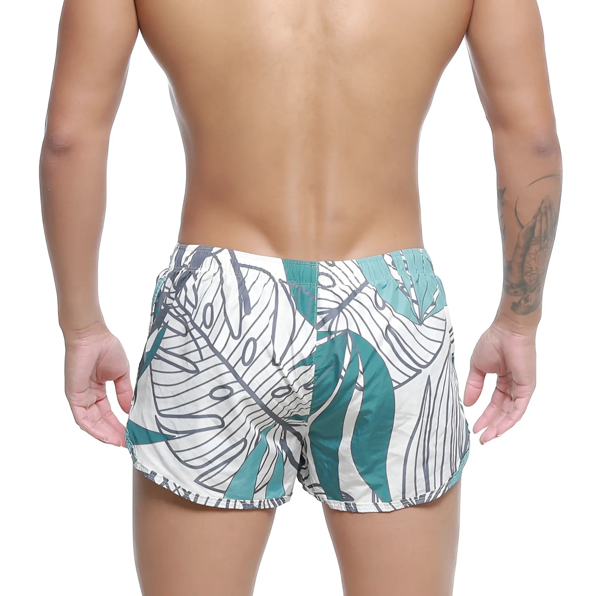 MetroMaleWear summer swim shorts meadow 4988-09 white swim trunks with bold teal and black tropical leaf pattern