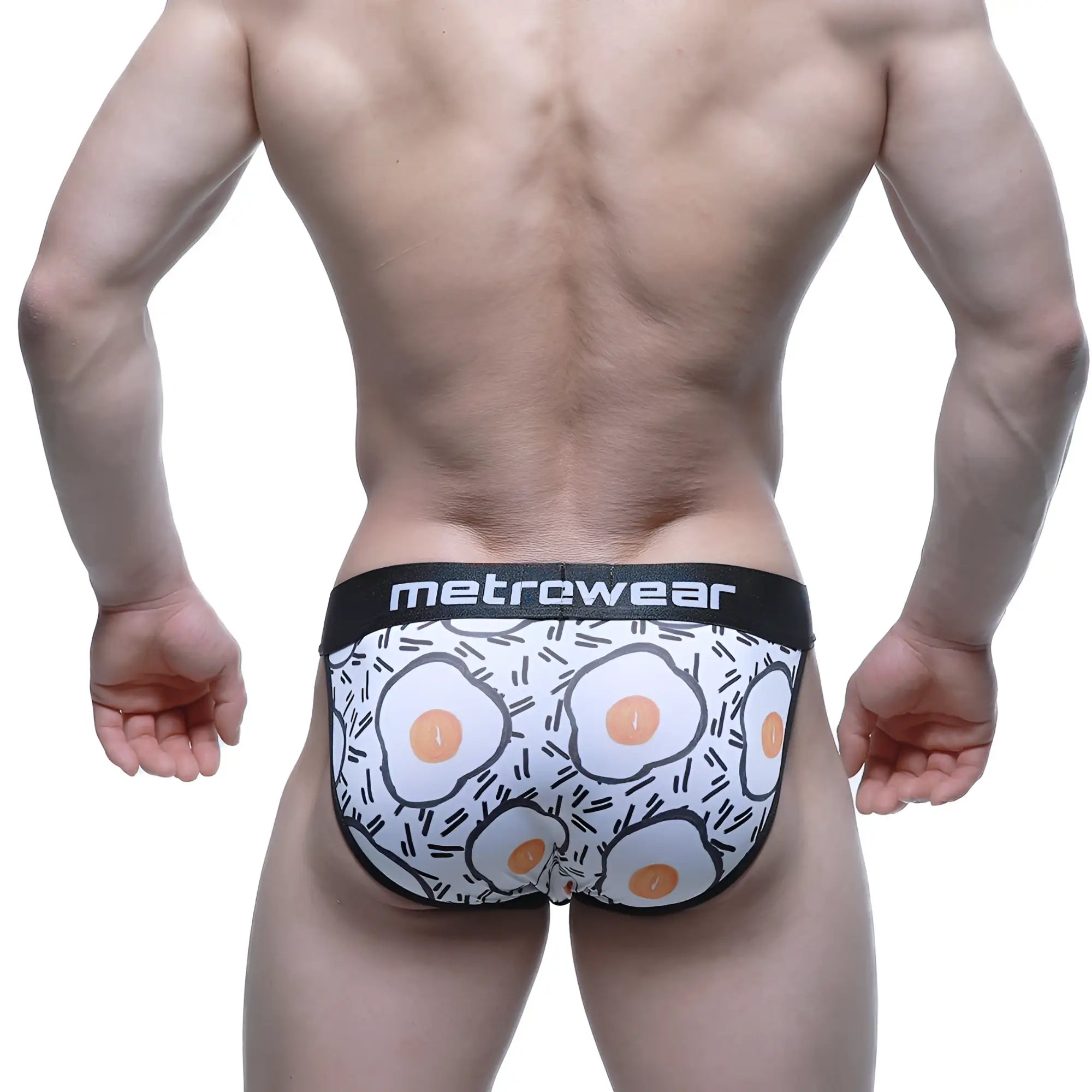 White men’s briefs with playful fried egg pattern and black trim by metrcwear metro male wear sunny side bikini 3004-55