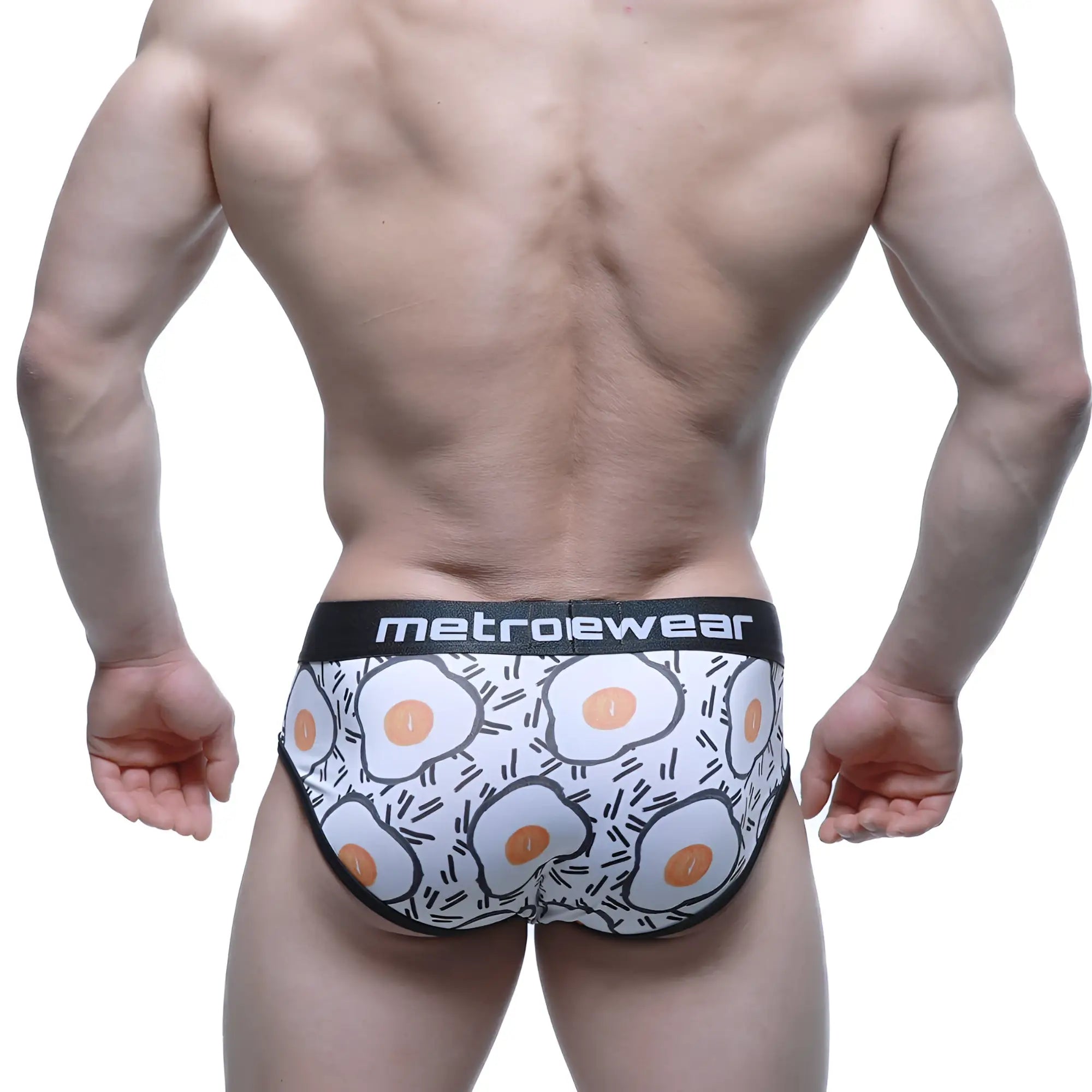 White metroewear briefs with orange and black cartoon fried egg pattern elastic waistband metroMalewear Sunny Side 5203-64