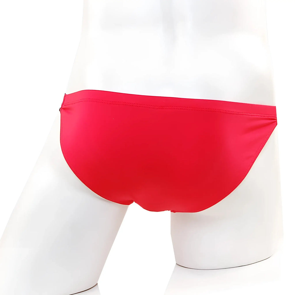 MetroMaleWear sup bikini valentine red swim trunks with bright red smooth textured fabric on a mannequin