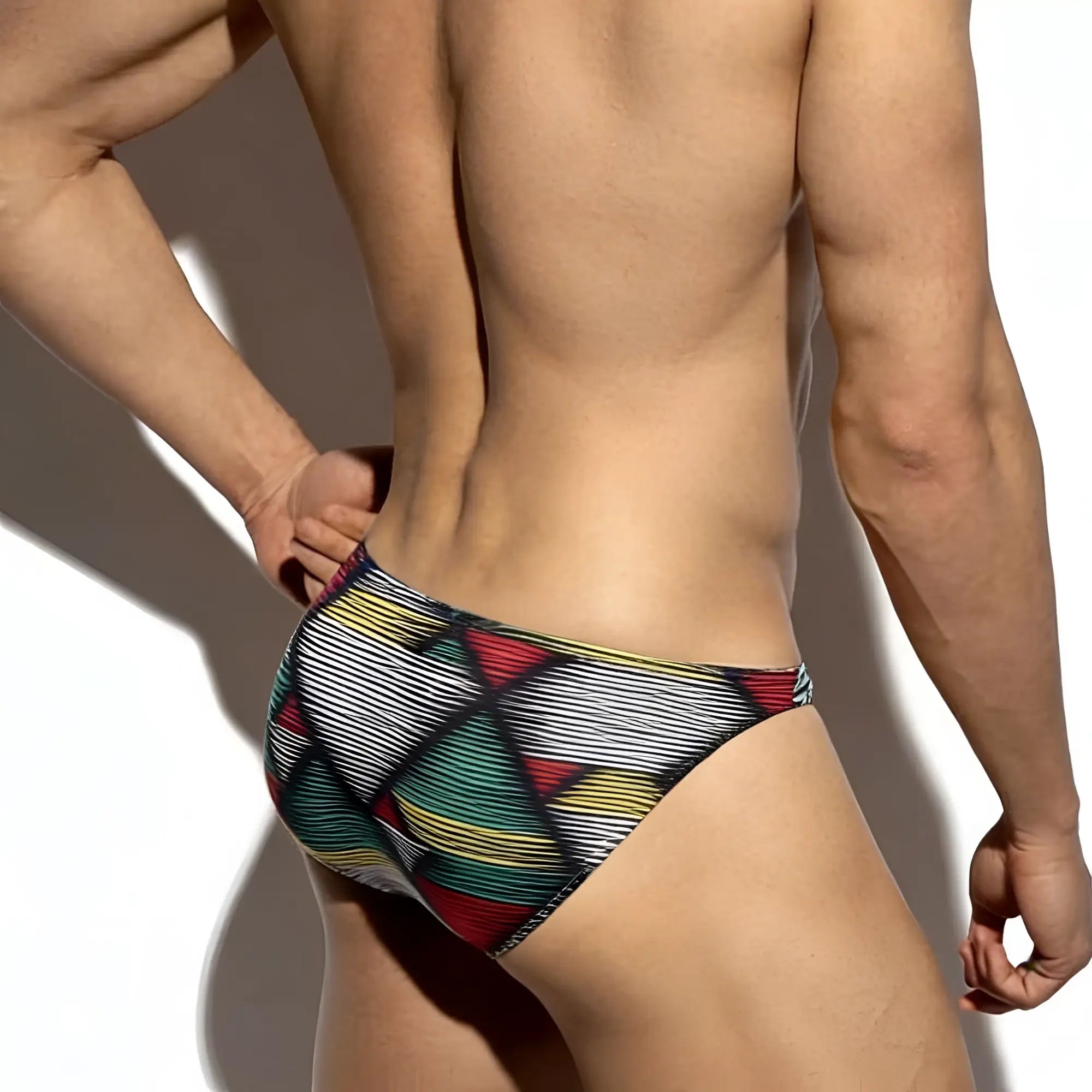 MetroMalewear super lowrise bikini cebada 6115-80 swim trunks with vibrant red green yellow and black geometric stripes
