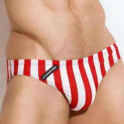 Red and white vertically striped swim bikini by metromalewear with black brand tag ideal for swimming and beachwear