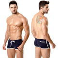 Navy blue MetroMaleWear terry swim trunks with white trim and front pocket for casual beachwear