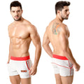 White terry sport shorts with red elastic waistband and trim featuring orange logo on left leg metroMalewear gray red 4701-10