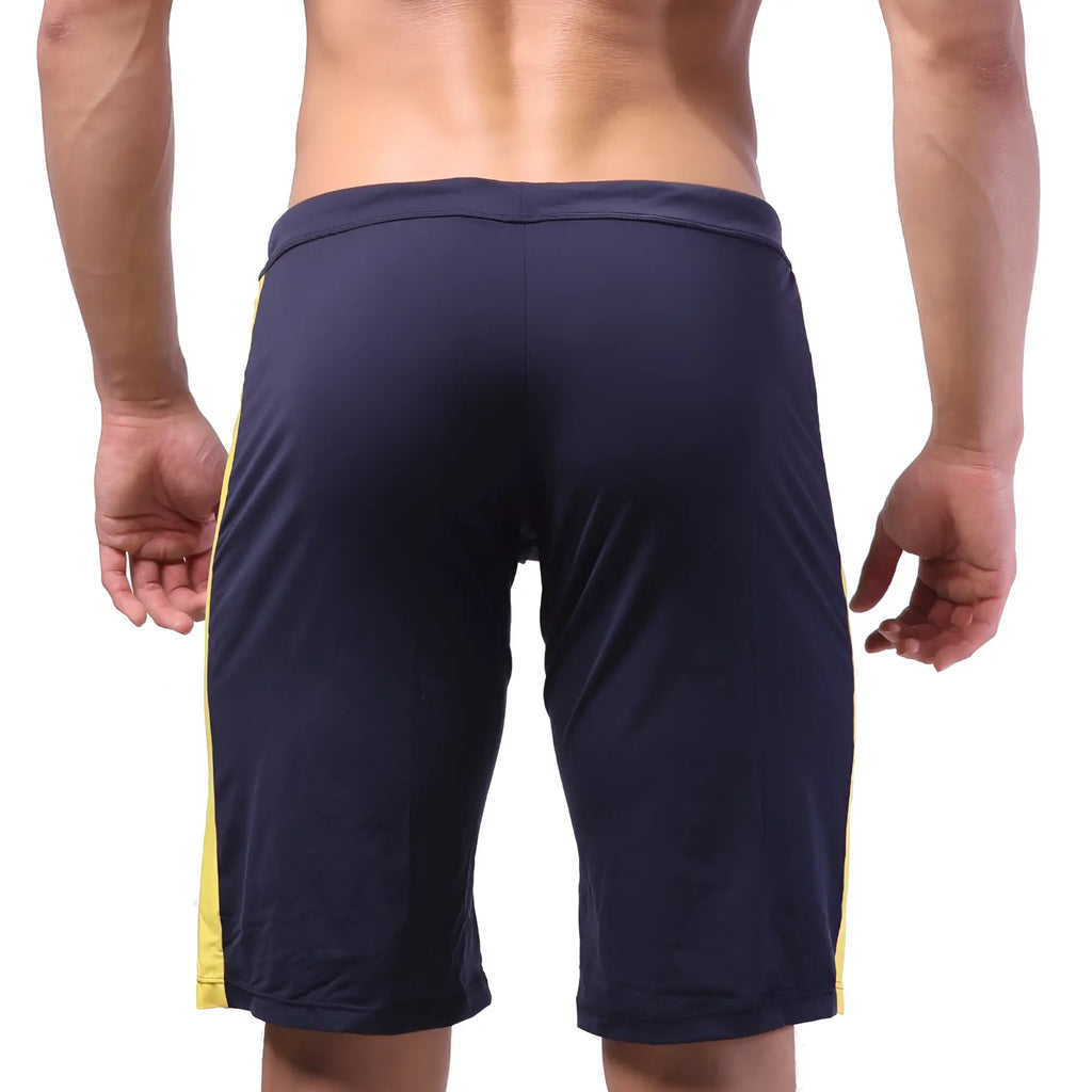 Navy blue metroMalewear trainer shorts with yellow side stripes designed for athletic performance and comfort
