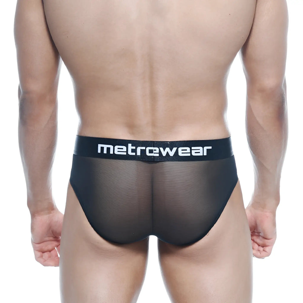 Black mesh metroMaleWear tron hip brief with a solid black waistband featuring the metrewear logo in white lettering