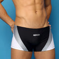 MetroMaleWear Ultra Square Cut athletic swim trunks in black silver and white with bold diagonal panels and modern design