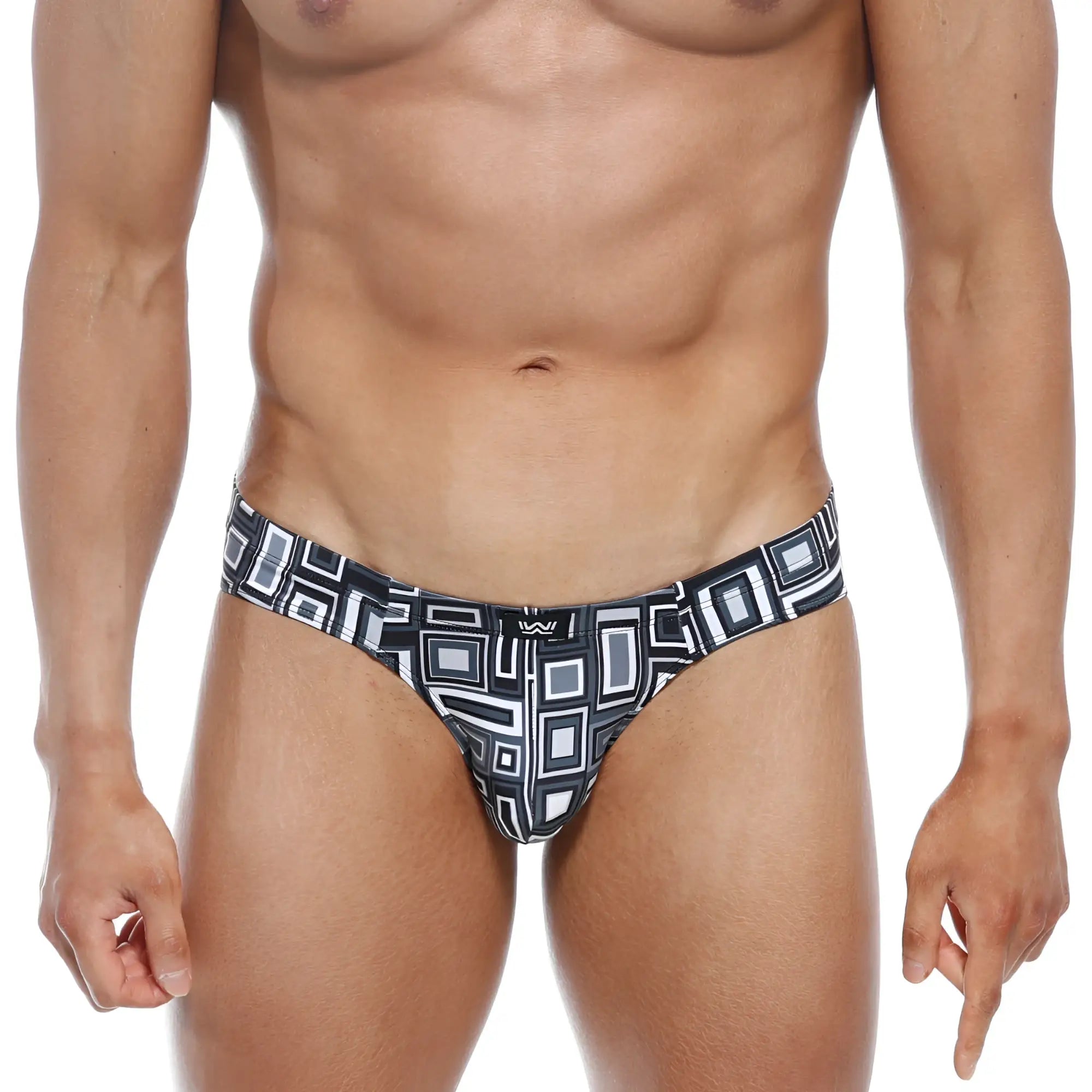 Black and white geometric-patterned MetroMaleWear Vasco Hip Brief swim trunks with a modern bold design