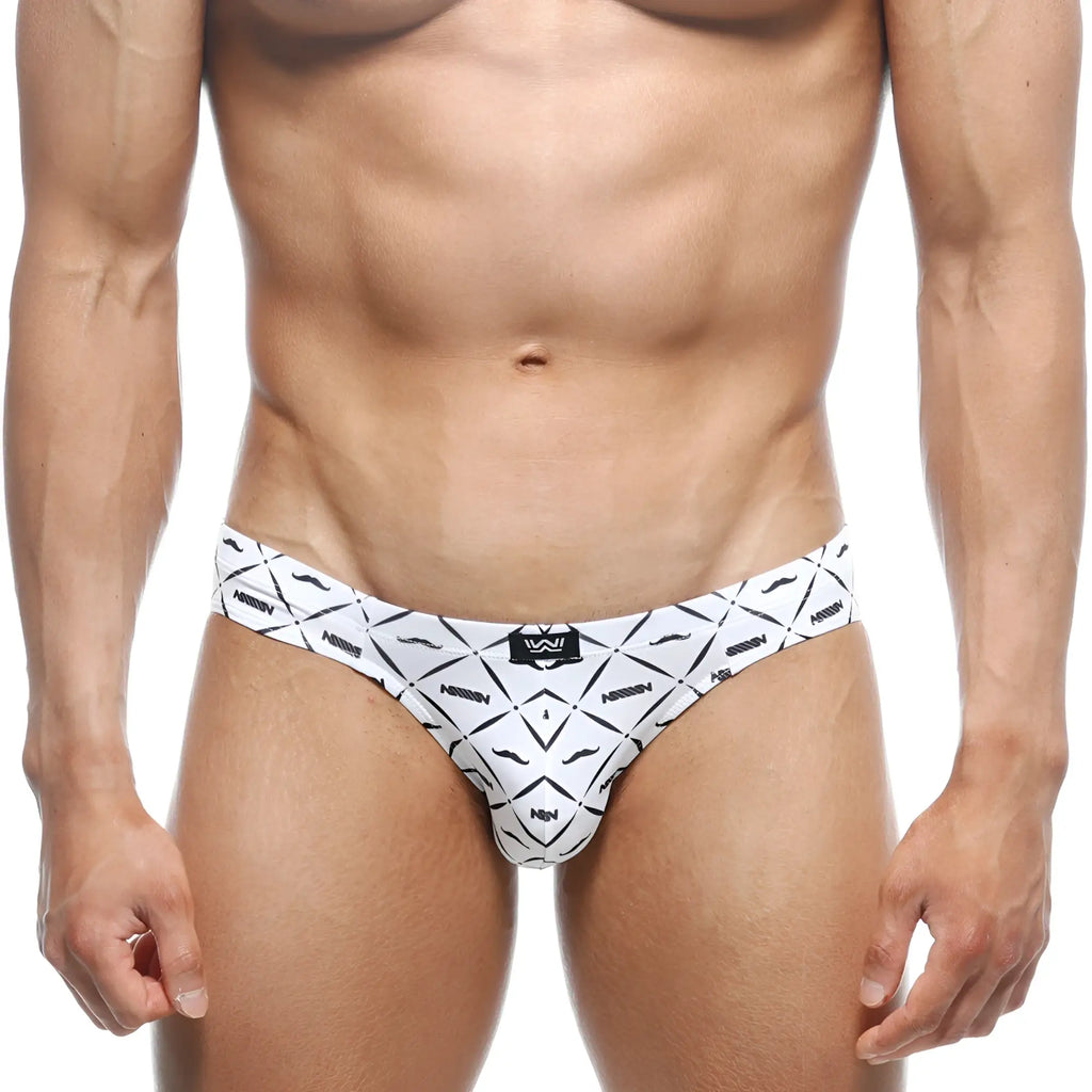 White mens briefs with bold black geometric and mustache patterns and naninen branding metroMalewear Vasco hip brief