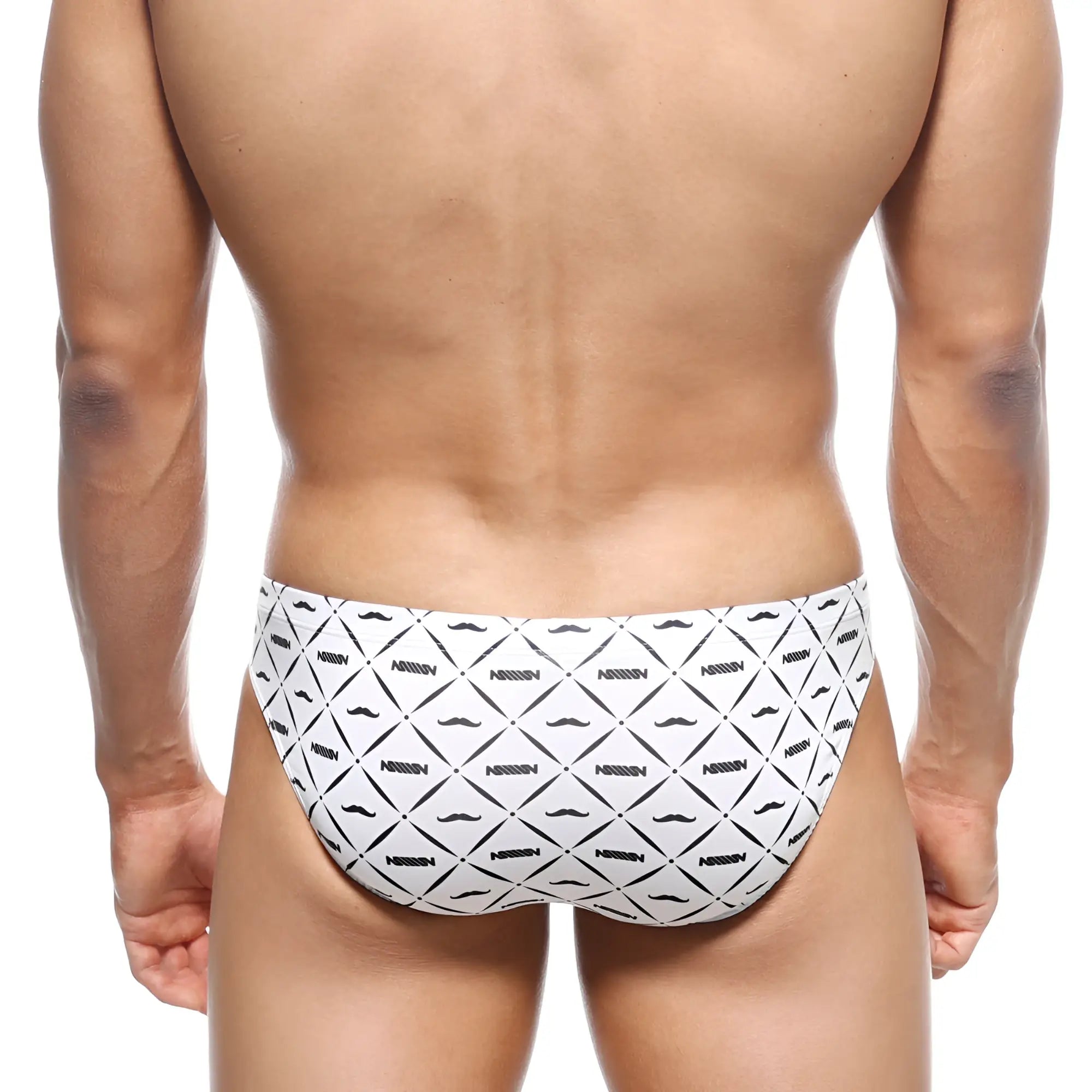 White swim trunks with black geometric mustache pattern and nassim text from metromalewear vasco hip brief caballero 5103-03