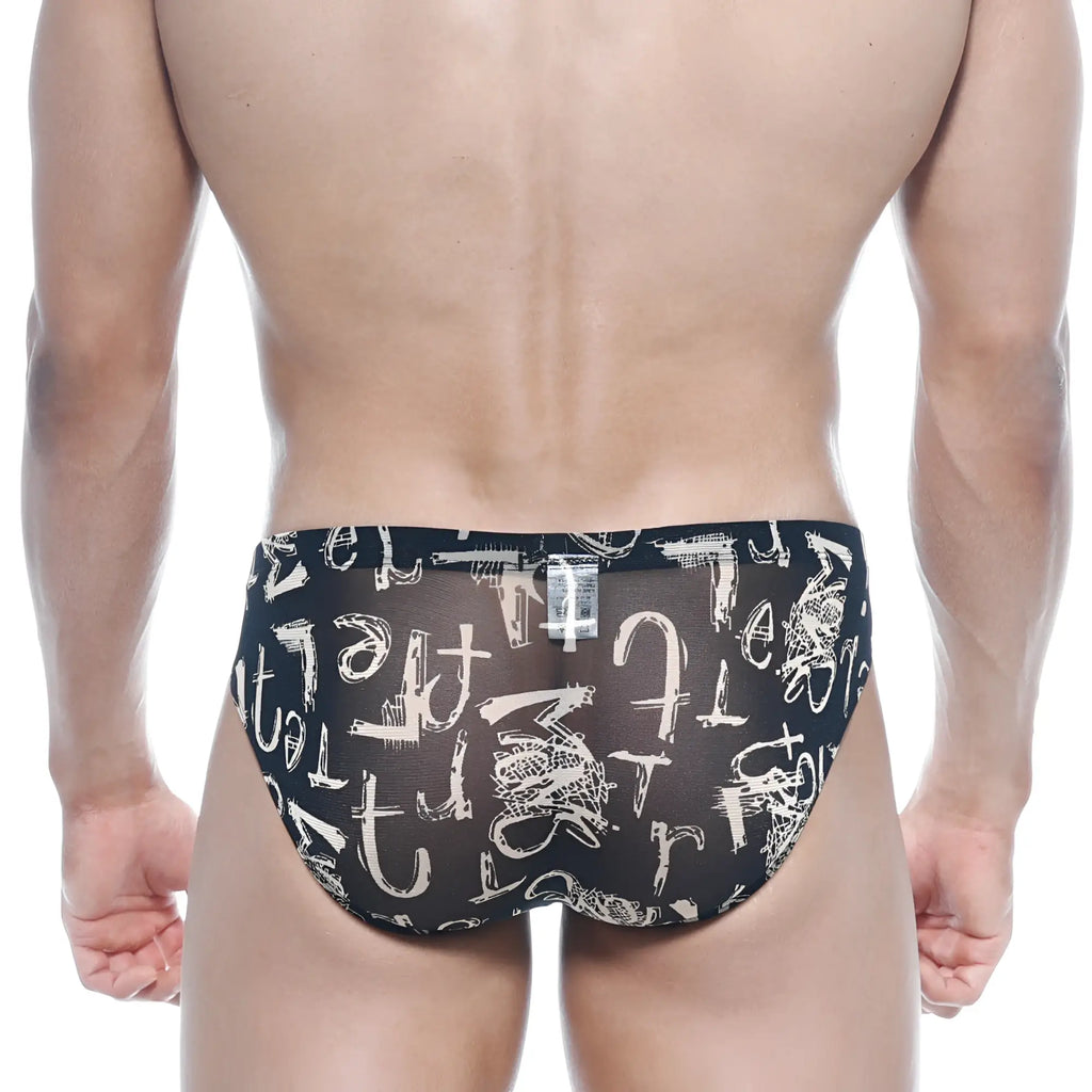 Black sheer swim trunks with bold white abstract graffiti pattern from metromalewear vasco hip brief oraculo 5103-78