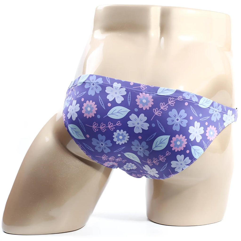 MetroMaleWear Vendeta bikini bottom purple floral pattern with light blue pink flowers on stretchy fabric
