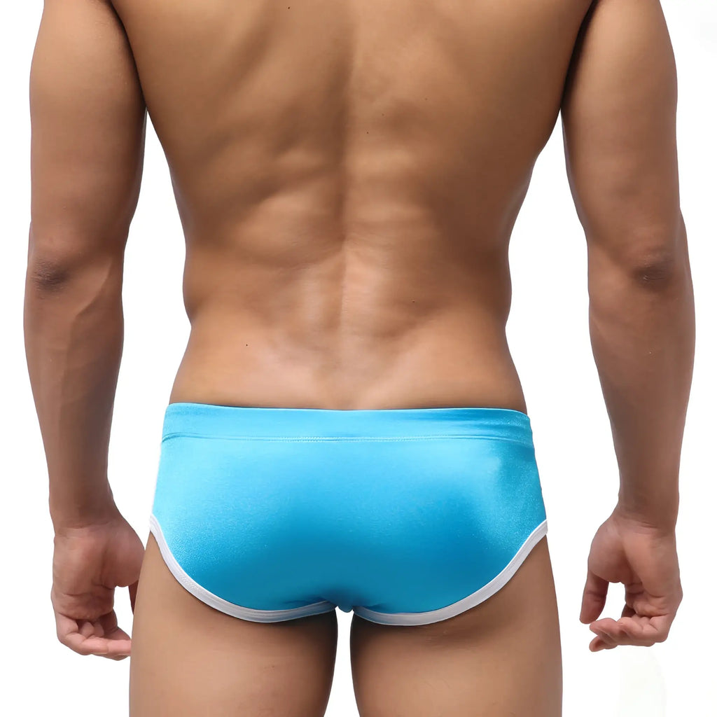 Bright blue MetroMaleWear wave swim brief with white trim for men in lightweight quick-dry fabric