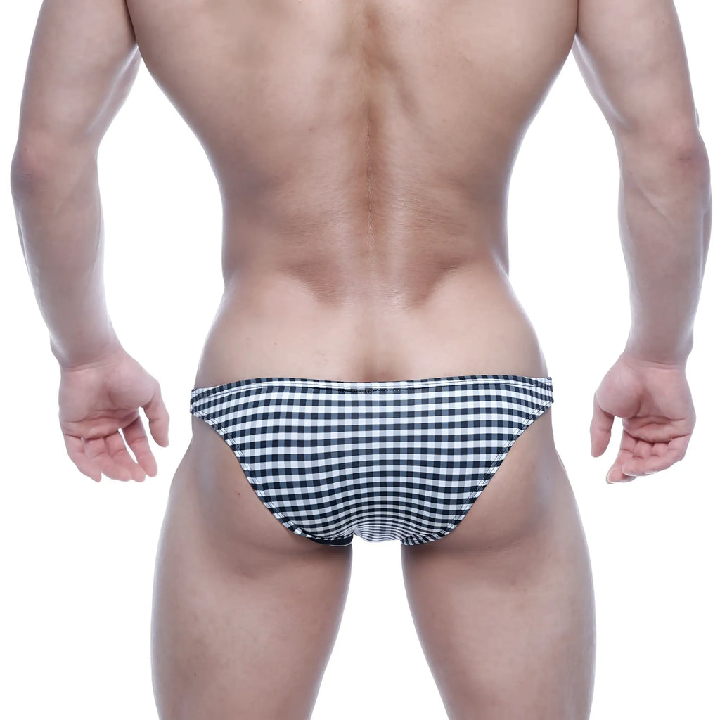 MetroMalewear Xtreme bikini black plaid swim trunks featuring black and white checkered pattern for active wear