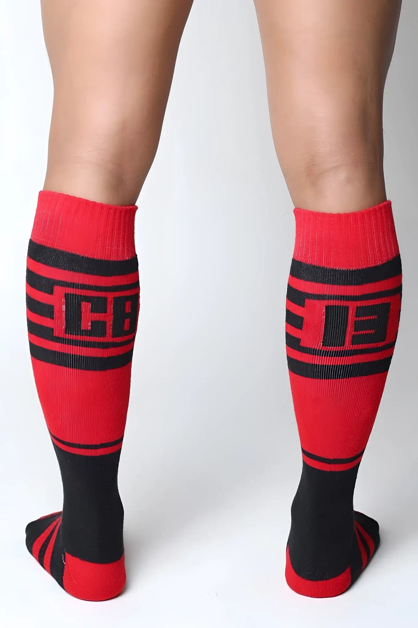 Red and black knee-high socks with bold horizontal stripes and a prominent cb logo on the calf from Midfield 7 colors