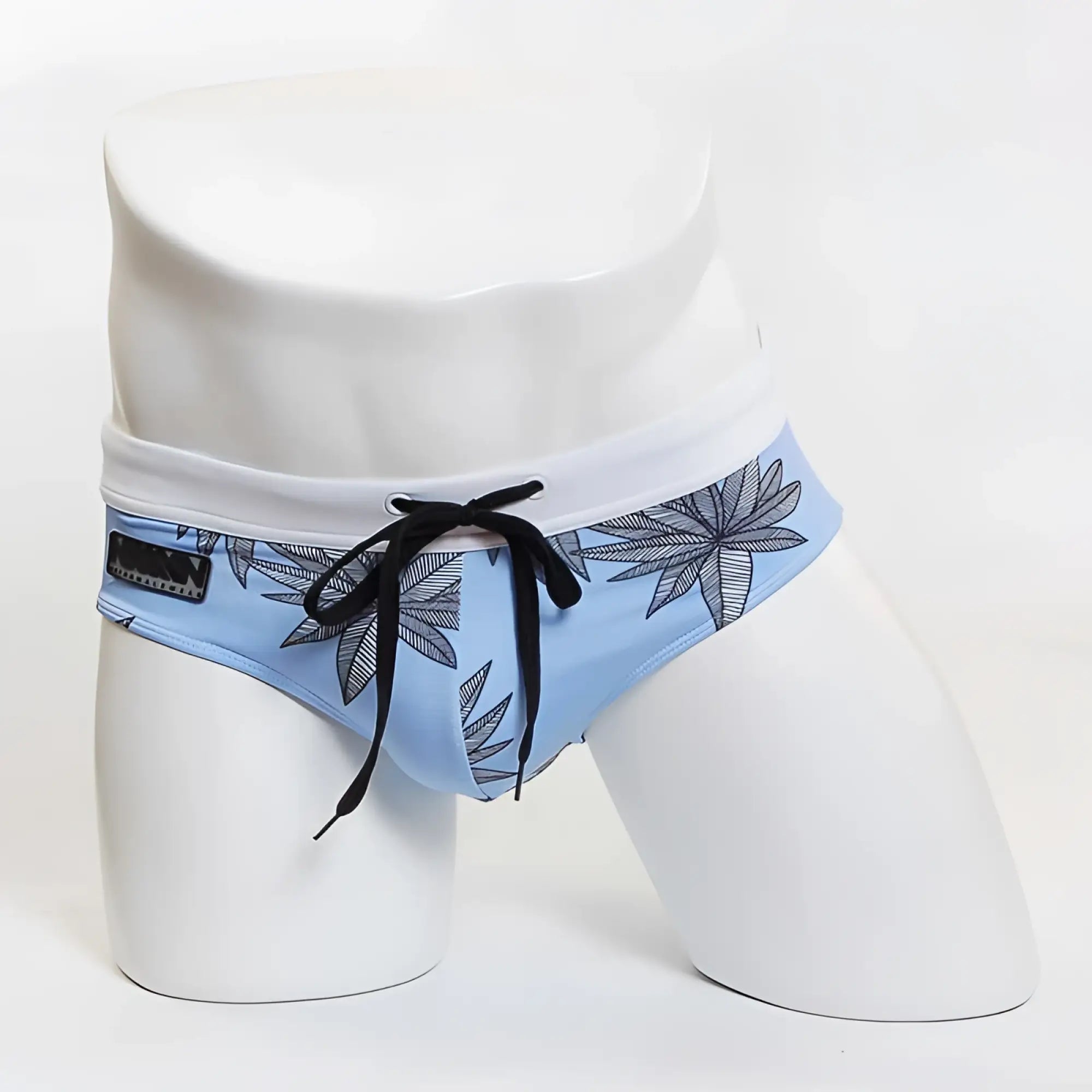 Sky blue miiw floral beach bikini swimwear with black leaf pattern white waistband and black drawstrings size s