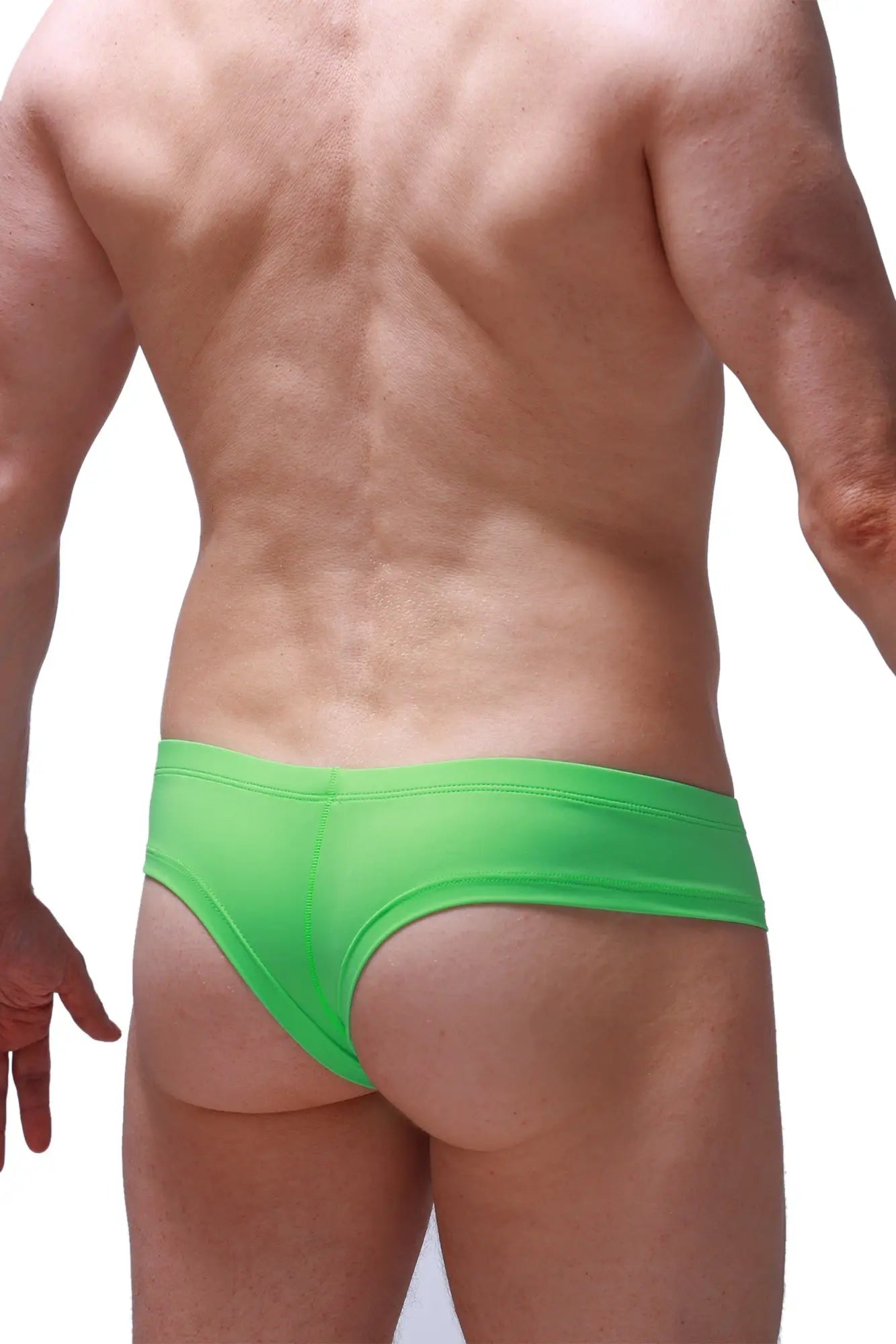 Bright green mini boxer swim trunks with smooth stretchy fabric and low-rise cut for comfortable fit