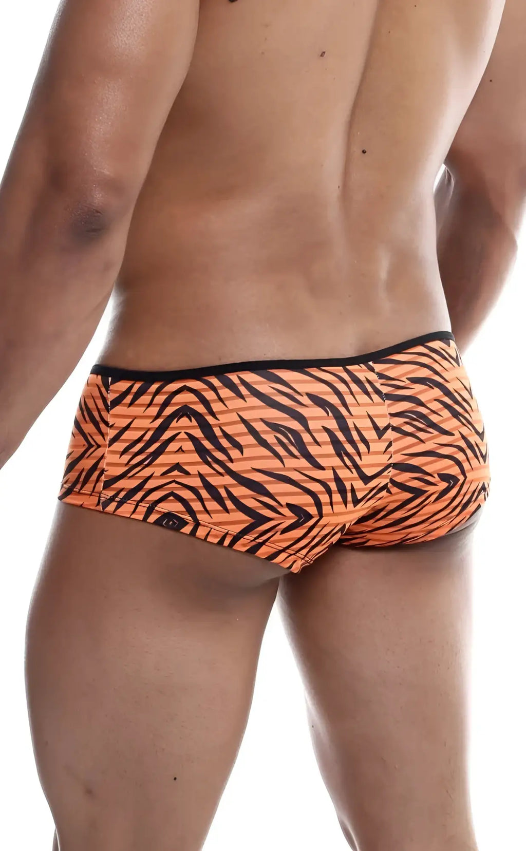 Mob boyshort orange tiger-striped swim trunks with black accents designed for comfortable activewear use