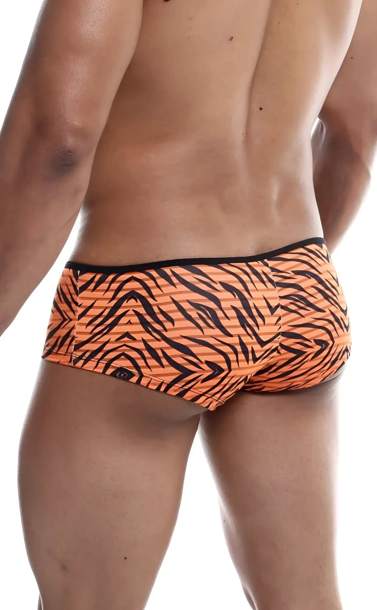 Mob boyshort orange tiger-striped swim trunks with black accents designed for comfortable activewear use