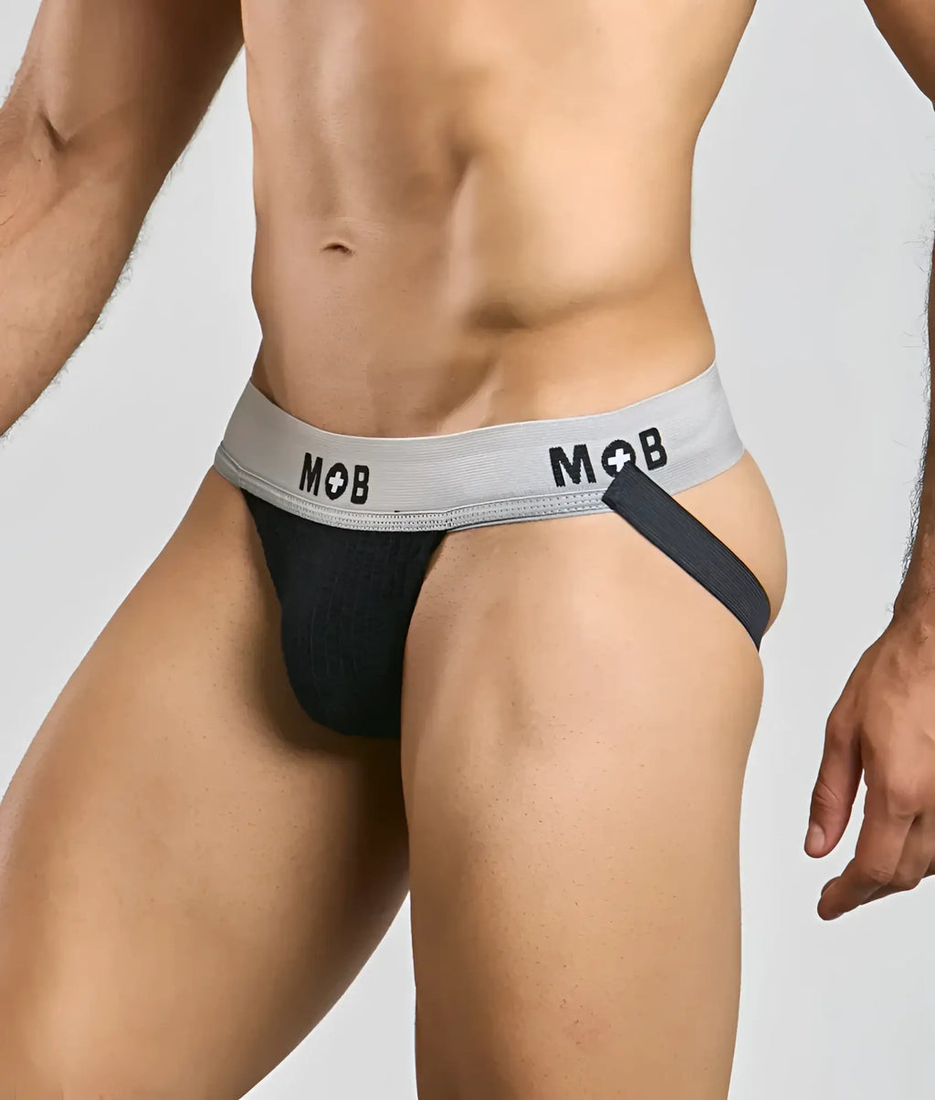 Mob classic jock 3 inches black briefs with gray waistband featuring mob logo and black side strap shown from the front