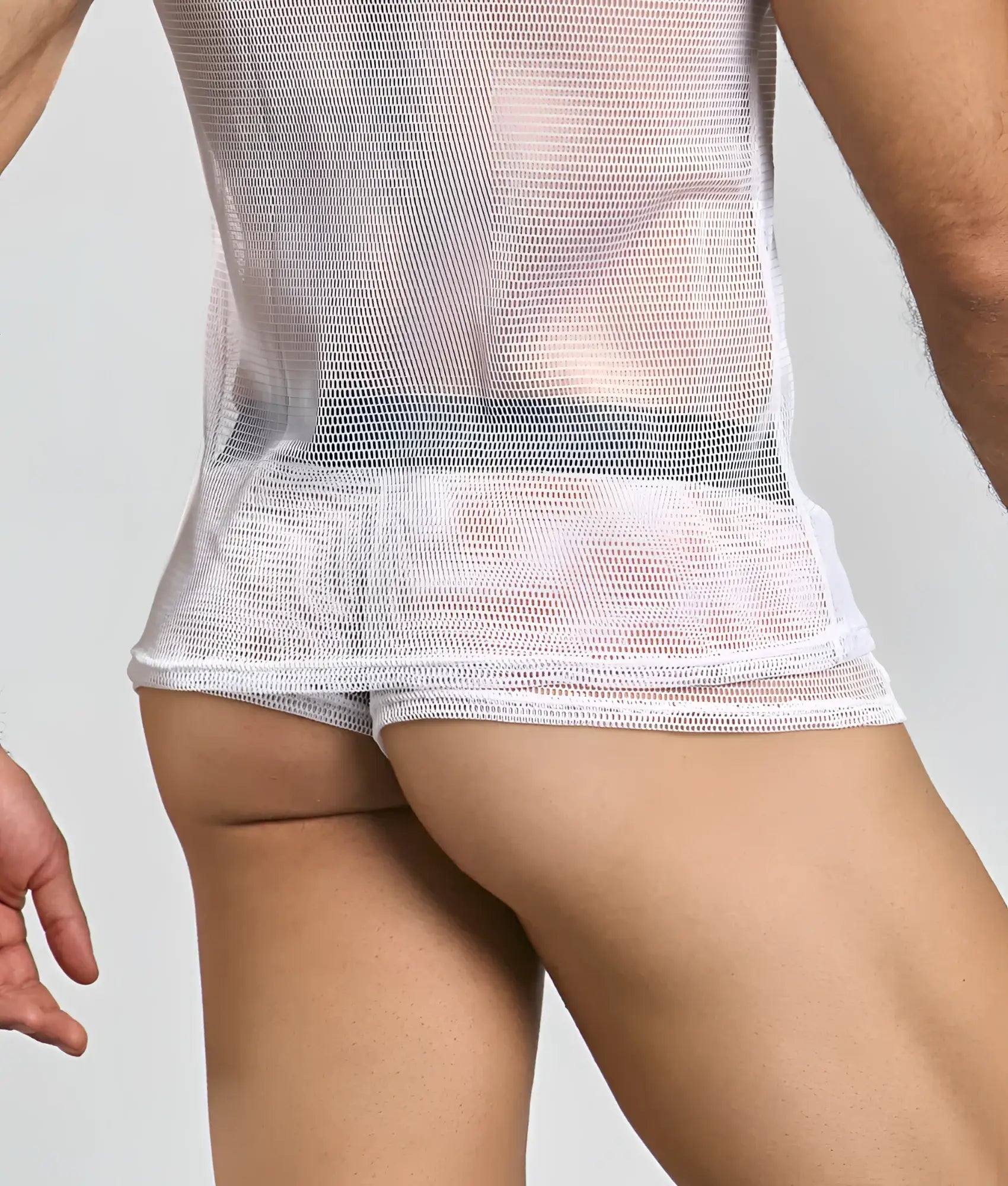 White mesh mob fishnet tanktop with a snug form-fitting design made of breathable mesh material