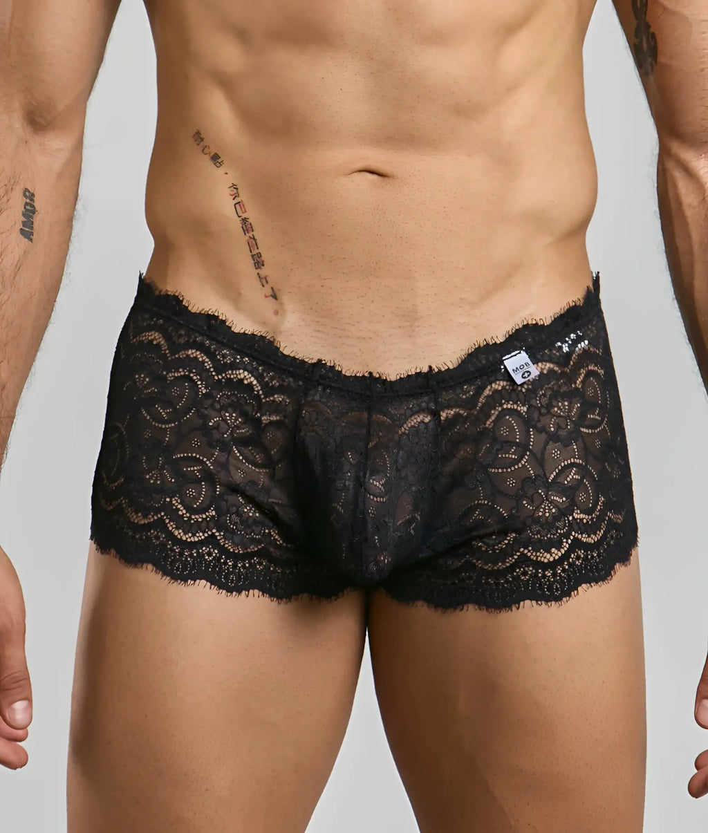 Black lace boxer short rose with intricate floral patterns and delicate frayed hem for men’s underwear