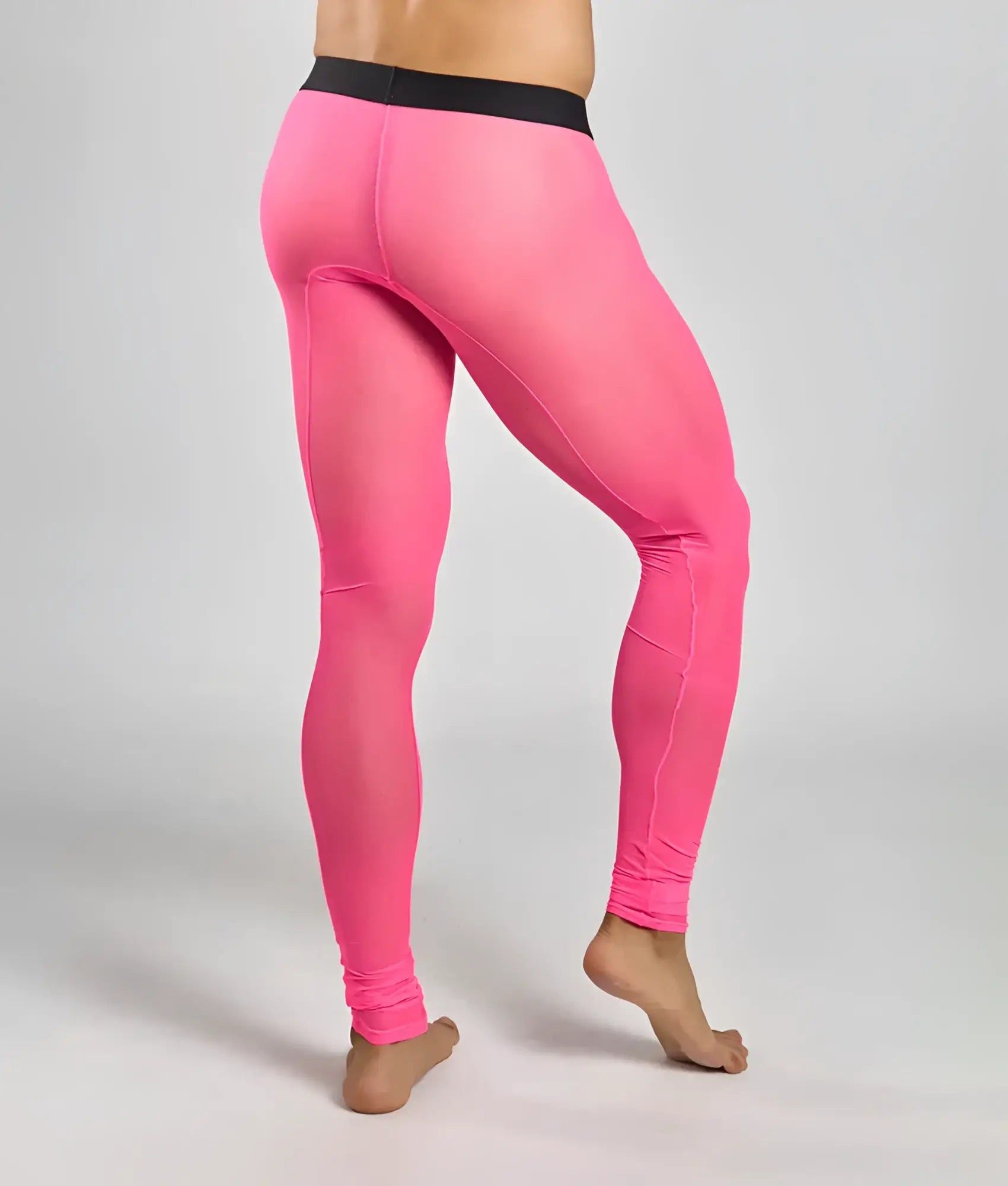 Bright pink mob mesh tights with form-fitting design and black waistband for activewear and performance