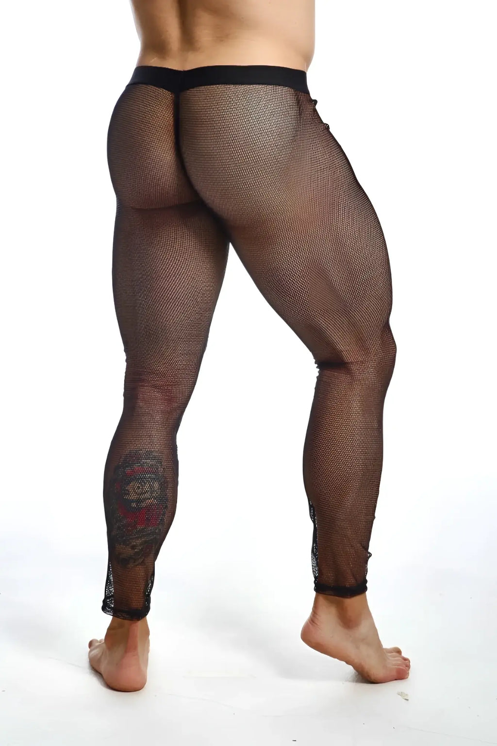 Black mesh leggings with lace floral design on lower leg from mob fishnet tights collection