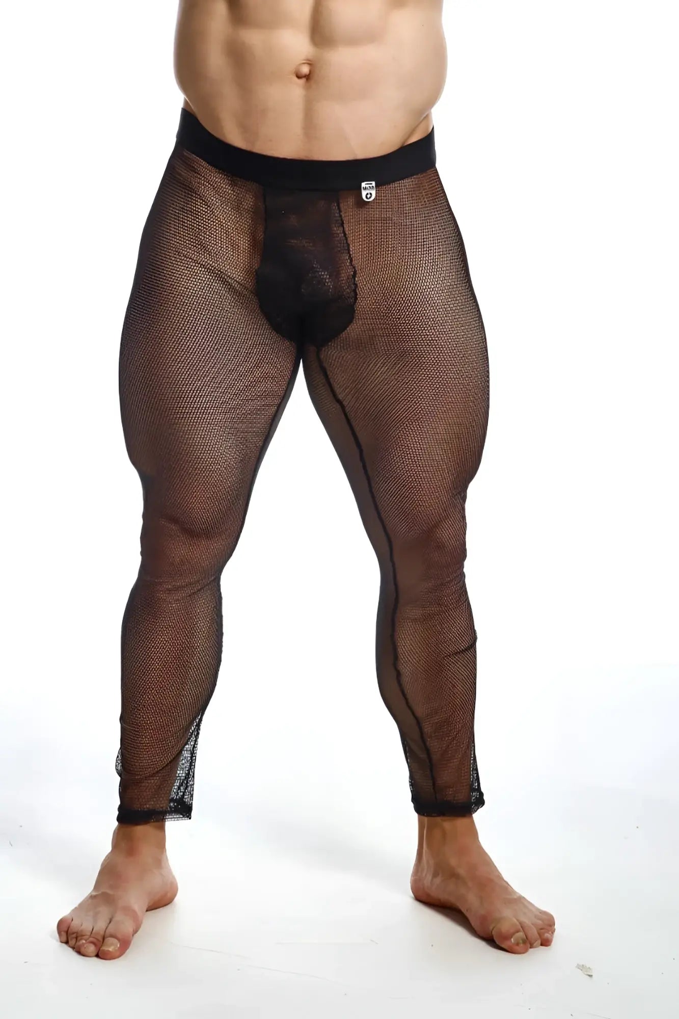 Black mesh leggings with solid black waistband and reinforced paneling from mob fishnet tights collection