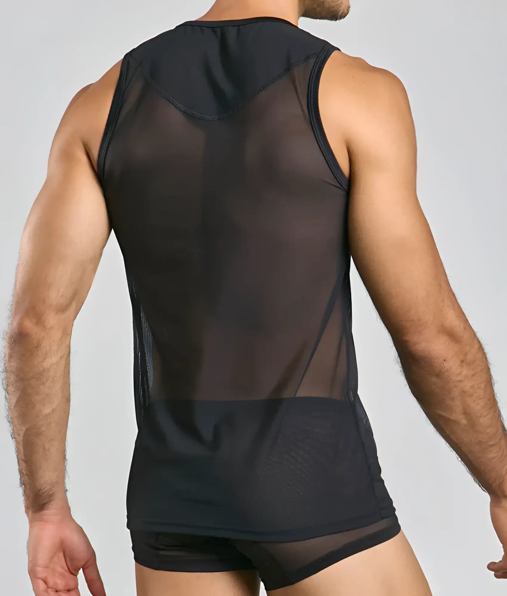 Black sheer mesh tank top with solid black panel at the bottom from mob lace tank top collection