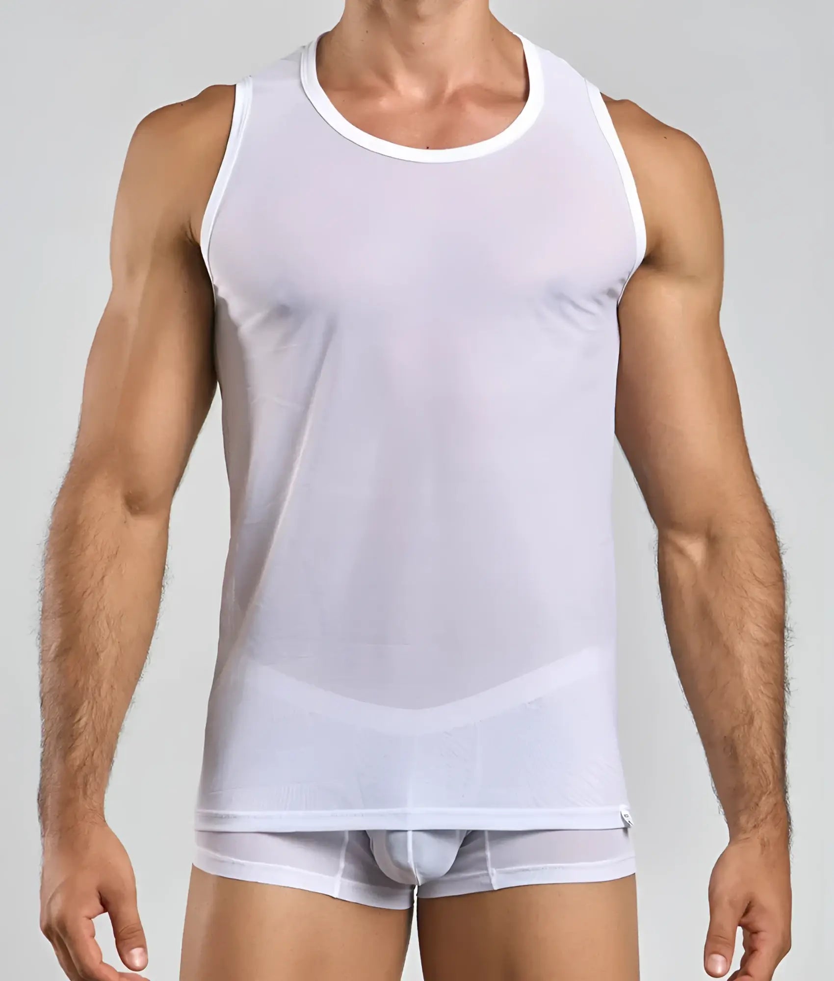 White sheer mesh lace tank top with round neckline and subtle curved design detail from MOB