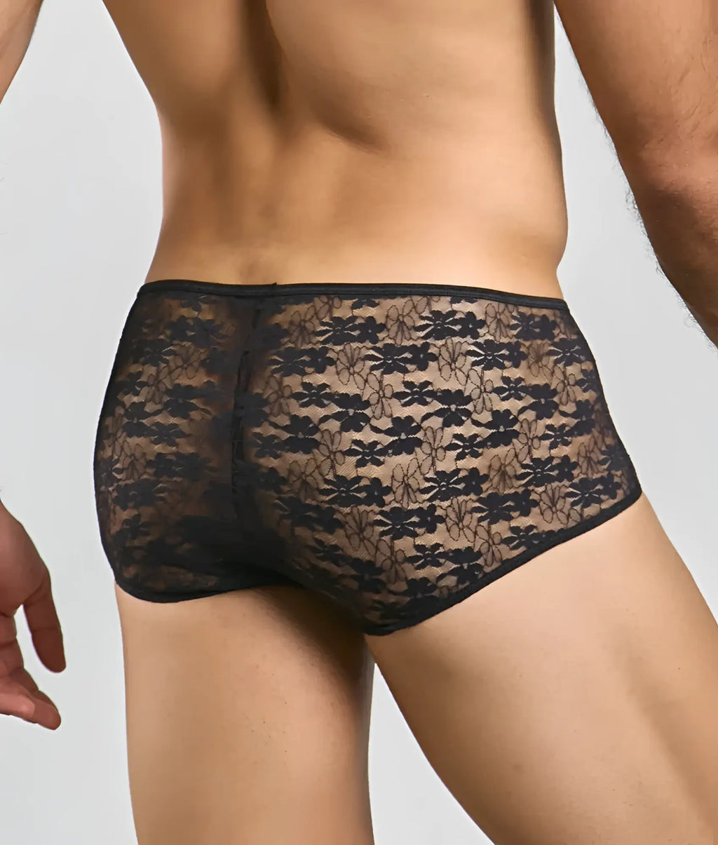 Black floral lace men’s briefs with sheer patterned design from mob loop cheeky trunk, front view