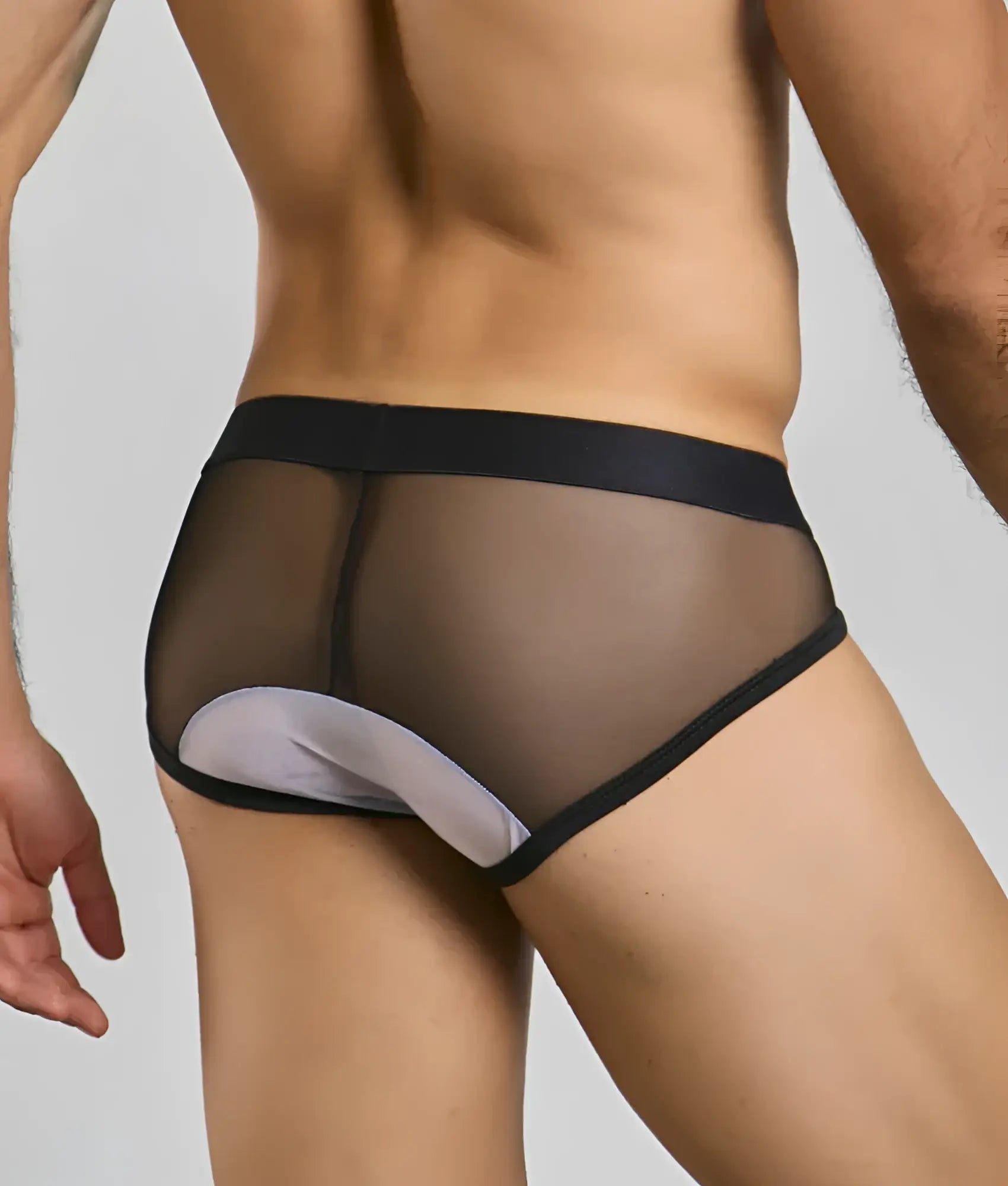 Black mesh briefs with white padded crotch panel from mob maitreD costume highlighting contrast and comfort