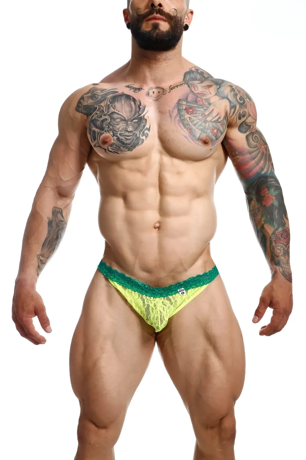 Neon green lace briefs with teal trim from MOB men’s lace jockstrap showcasing delicate lace fabric design