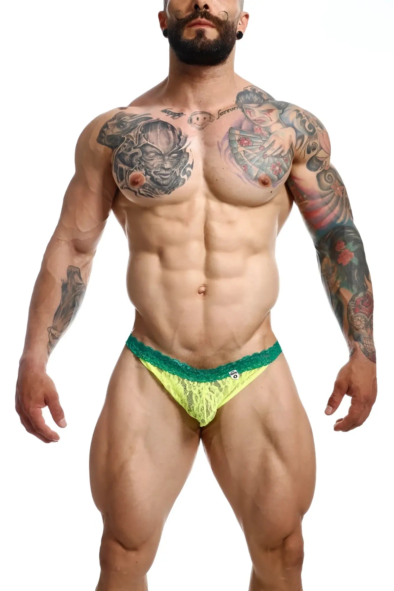 Neon green lace briefs with teal trim from mob men’s lace jockstrap showcasing vibrant lace material and design