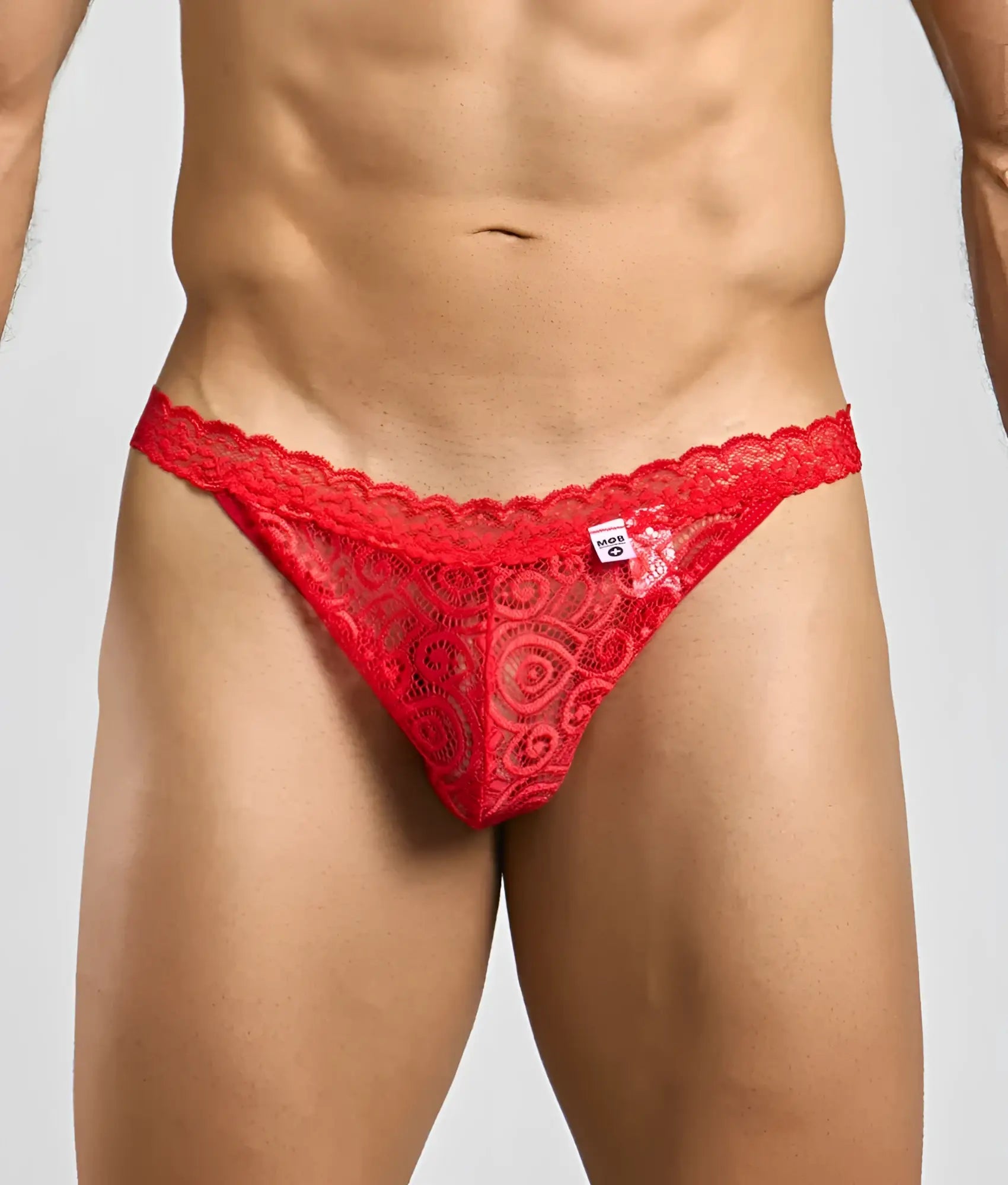 MOB mens lace jockstrap in red with an intricate paisley pattern and scalloped edge detailing