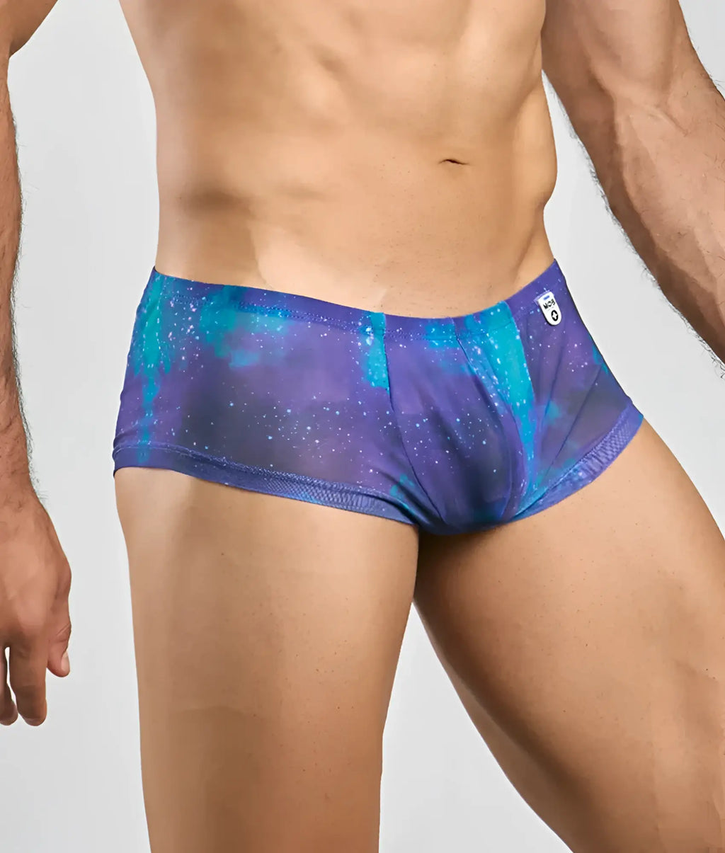 Mob men’s sexy sheer hip brief in purple and teal galaxy pattern with subtle mesh texture