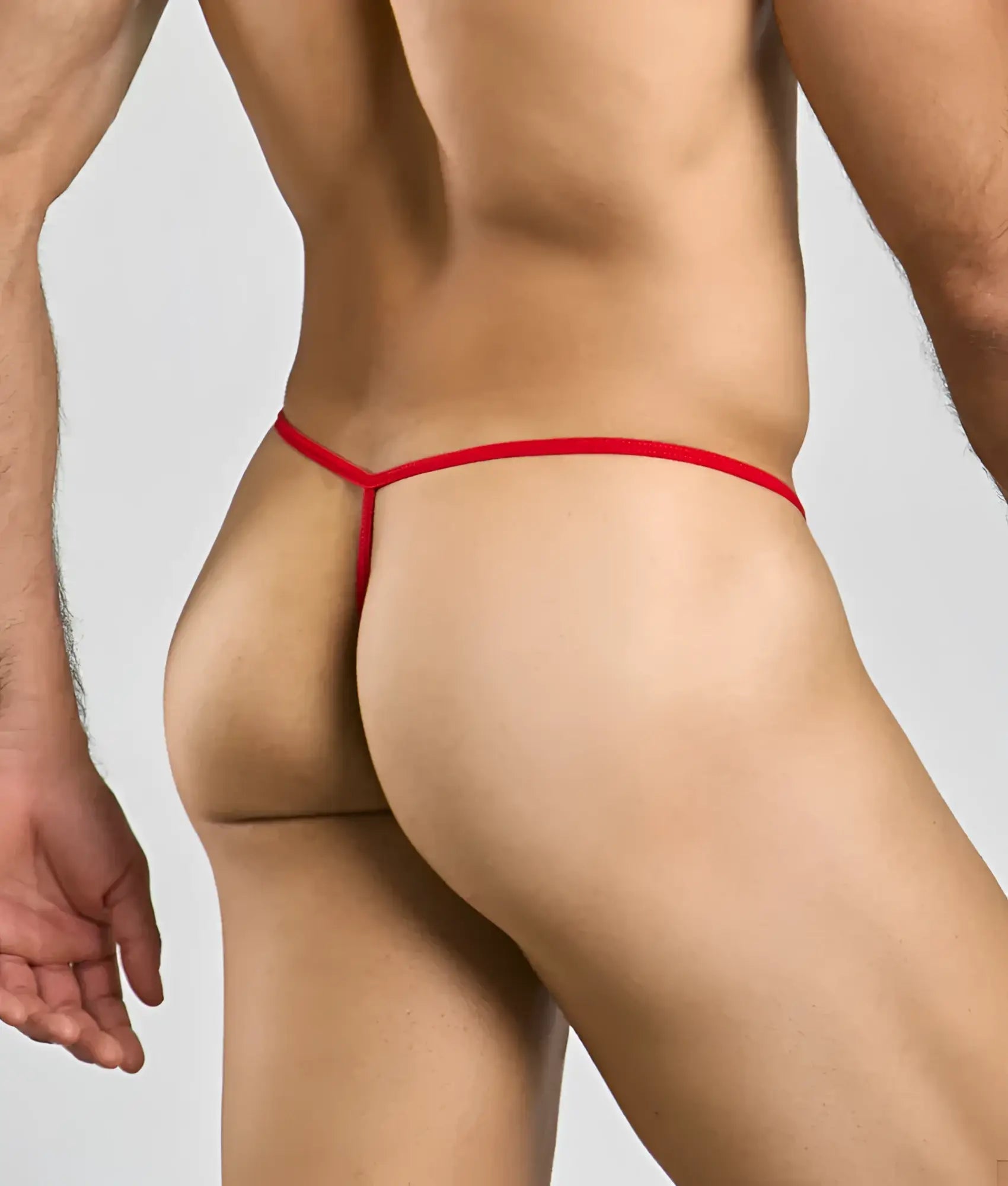 Red thong with thin smooth elastic band showing the back side in mob mens sheer t back thong design