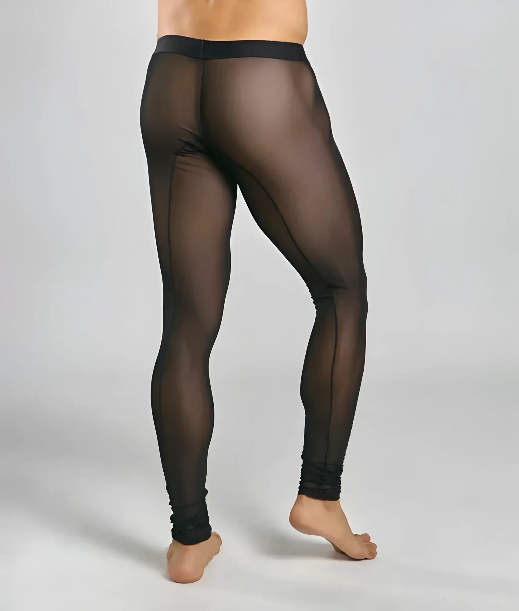 Black sheer mesh tights with solid black waistband and ankle cuffs from mob perfect for layering or activewear
