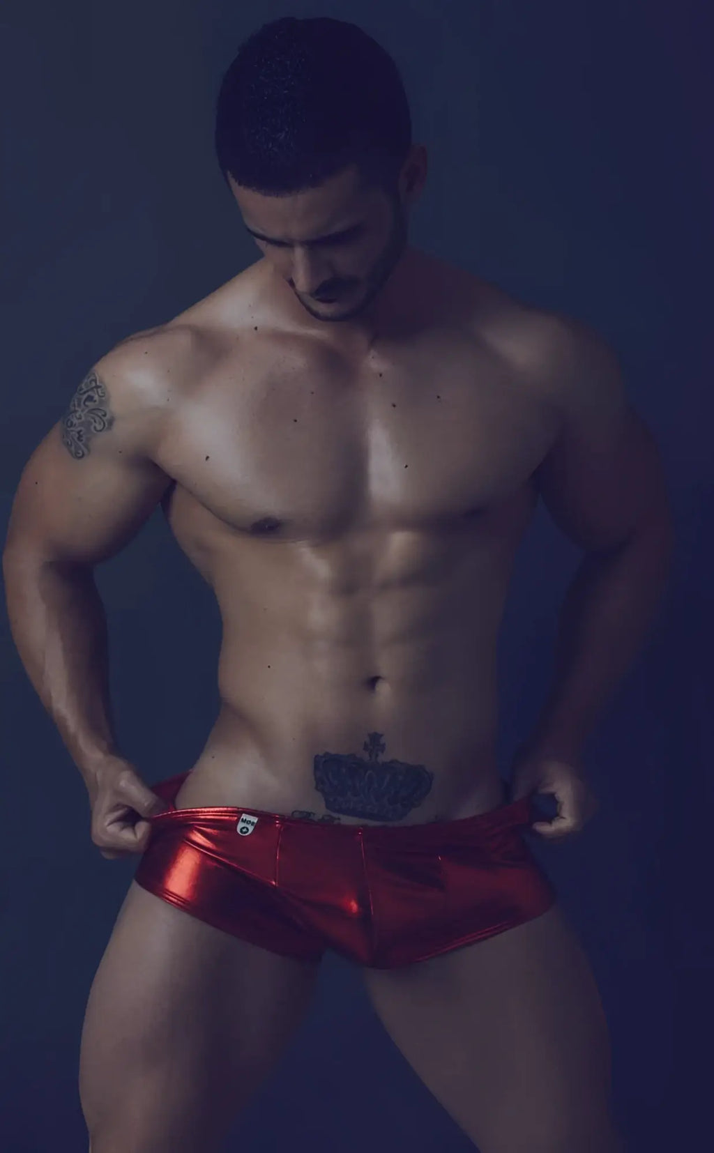 Shiny red metallic mob mirror boxer briefs made from reflective material for stylish and comfortable wear