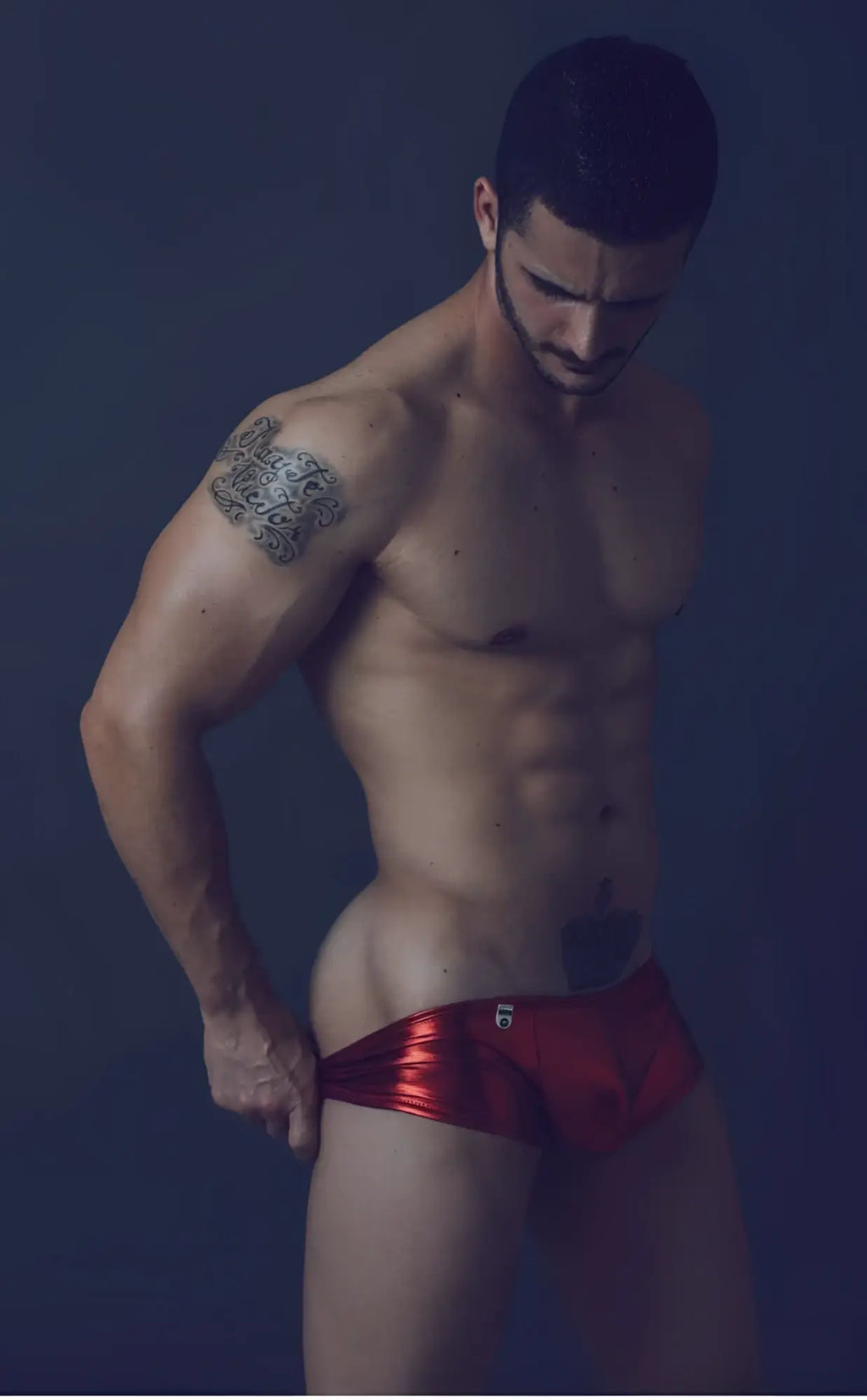 Shiny red metallic mob mirror boxer briefs with a small logo on the front for stylish comfort