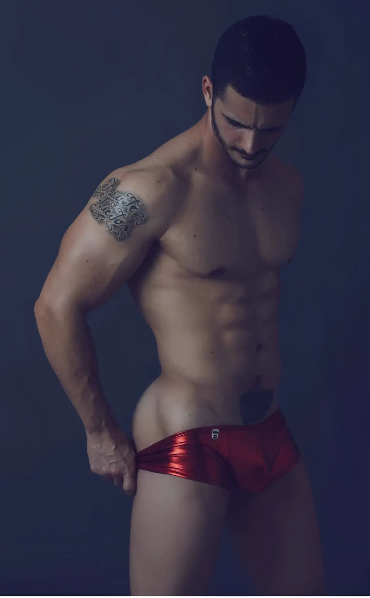 Shiny red metallic mob mirror boxer briefs with a small logo on the front for stylish comfort