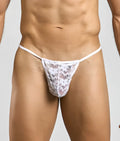 White lace thong with delicate floral pattern and thin elastic waistband shown from the back in MOB Print G-String New