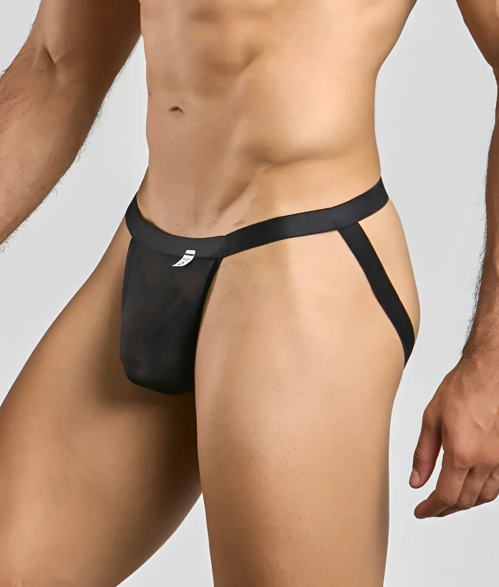 Black mesh briefs with a sleek minimalist design and small white logo on the waistband for MOB Sexy Mesh and Lace Jockstrap