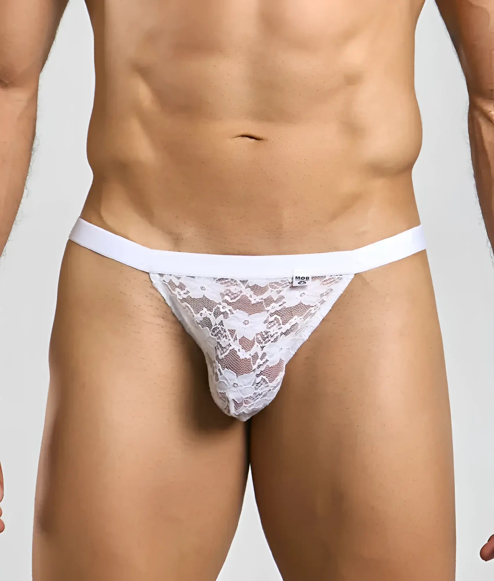 White lace thong with solid white waistband in mob sexy mesh and lace jockstrap design shown from the back