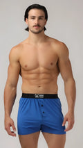Modern boxer blue boxer shorts with black waistband white logo and three front buttons for comfortable wear
